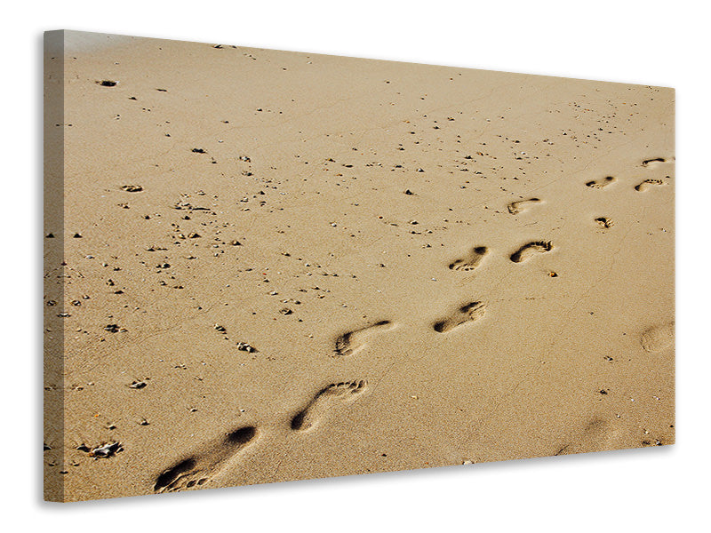 Leinwandbild Fußspuren im Sand