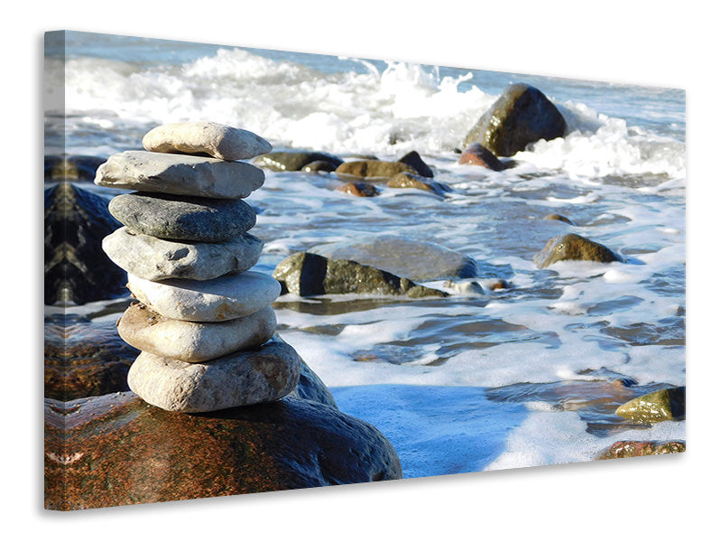 Leinwandbild Steinstapel am Meer